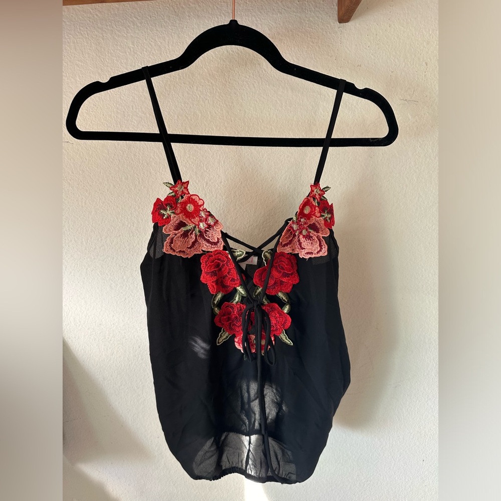 Black blouse with rose details